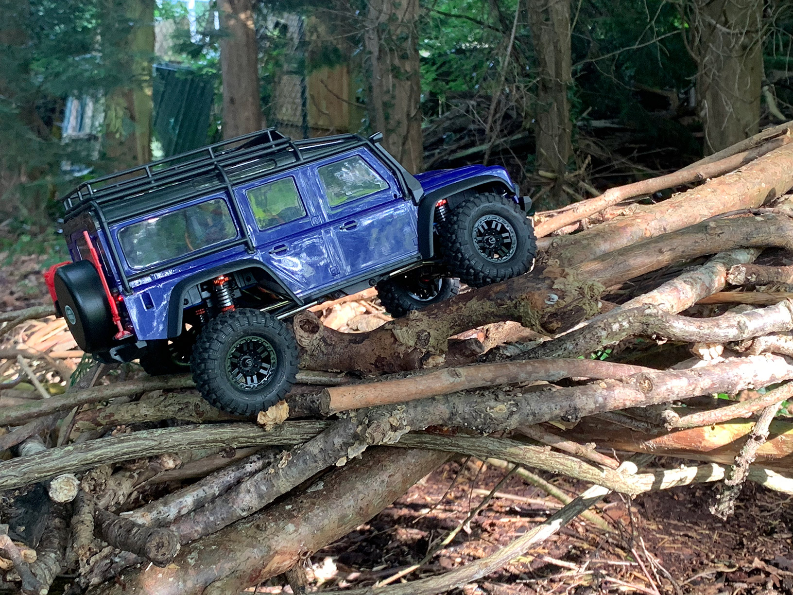 Axial SCX24 scaling the rock face section of the Orbital RC crawler course